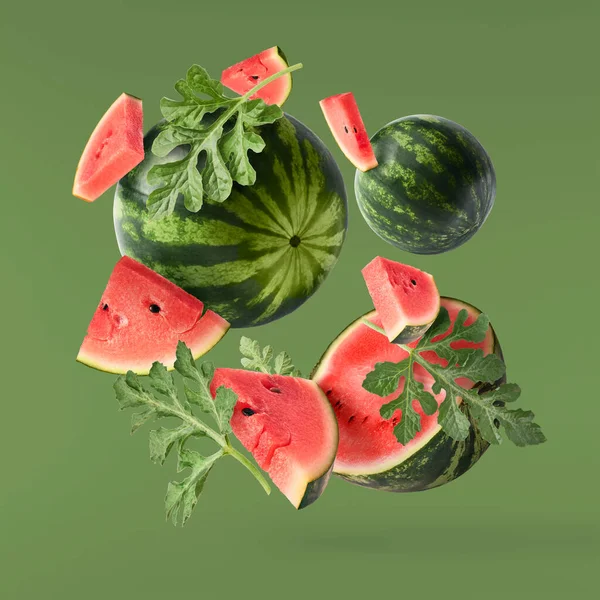 Fresh Raw Watermelon Falling Air Isolated Green Background Food Levitation Stok Gambar Bebas Royalti