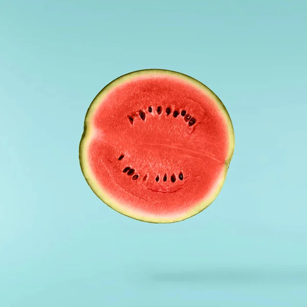 Fresh Raw Watermelon Falling Air Isolated Blue Background Food Levitation Stok Gambar Bebas Royalti