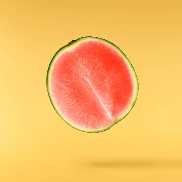 Fresh Raw Watermelon Falling Air Isolated Yellow Backgeound Food Levitation Stok Gambar Bebas Royalti