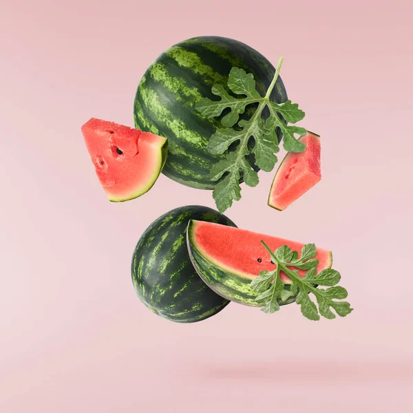 Fresh Raw Watermelon Falling Air Isolated Pink Background Food Levitation Stok Foto Bebas Royalti