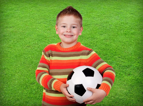 Bambino studente con pallone da calcio — Foto Stock