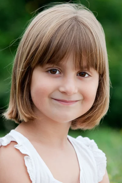 Menina com um sorriso agradável — Fotografia de Stock