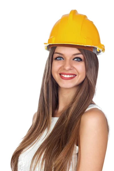 Mulher jovem com um capacete de construção — Fotografia de Stock