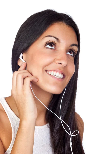 Casual ung flicka lyssnar musik — Stockfoto