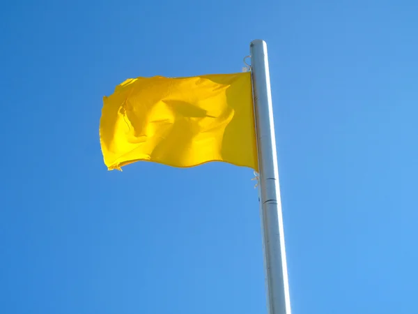 Flaga uwagę żółty — Zdjęcie stockowe