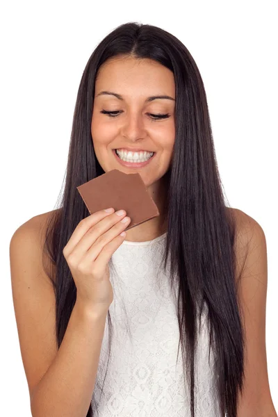 Chica joven comiendo chocolate —  Fotos de Stock