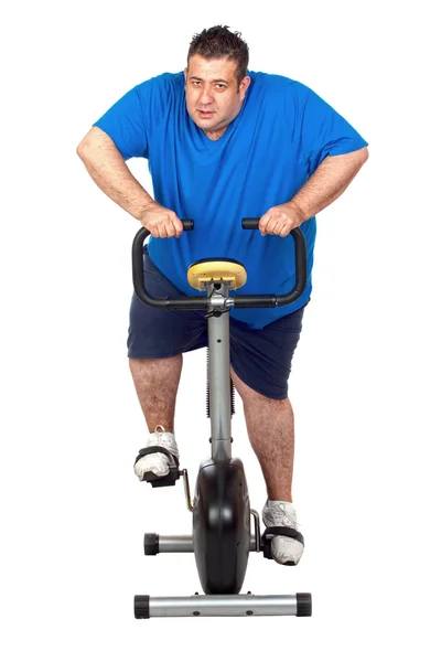 Tlustý muž hraní sport izolovaných na bílém pozadí — Stock fotografie
