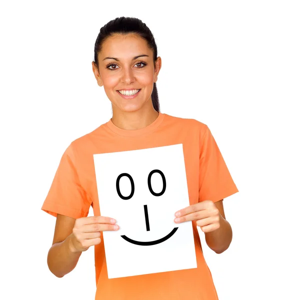 Chica sosteniendo un papel con una cara feliz pintada —  Fotos de Stock