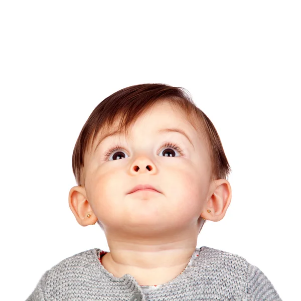 Surprised baby girl looking up — Stock Photo, Image