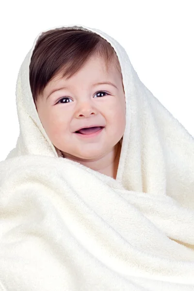 Happy baby covered with a towel — Stock Photo, Image