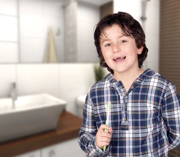 Smiling child without a toothbrush — Stock Photo, Image