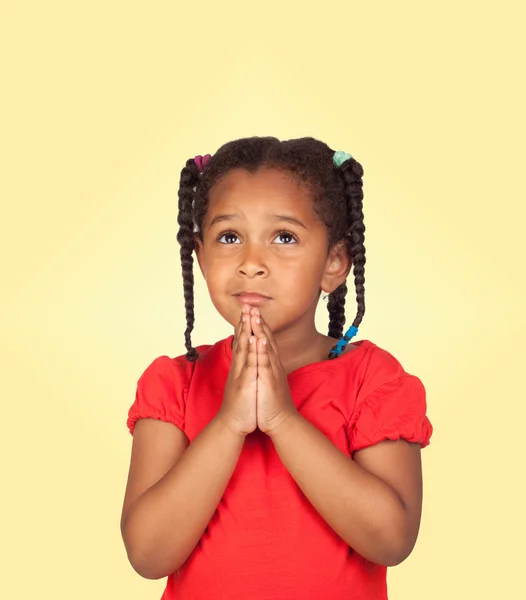 Sad little girl praying for something Stock Image