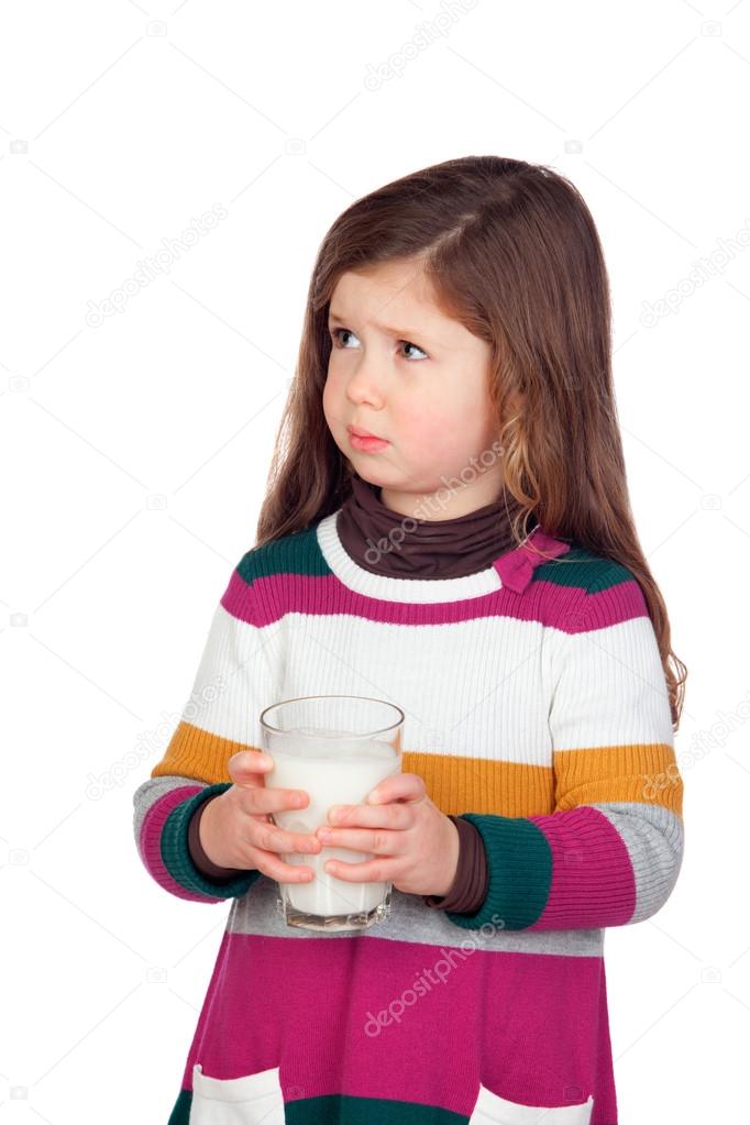 Pretty girl with a milk glass
