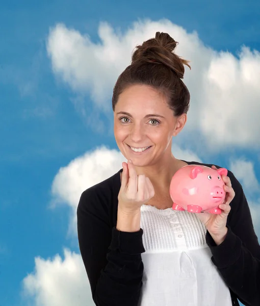 Attractive girl with money box — Stock Photo, Image