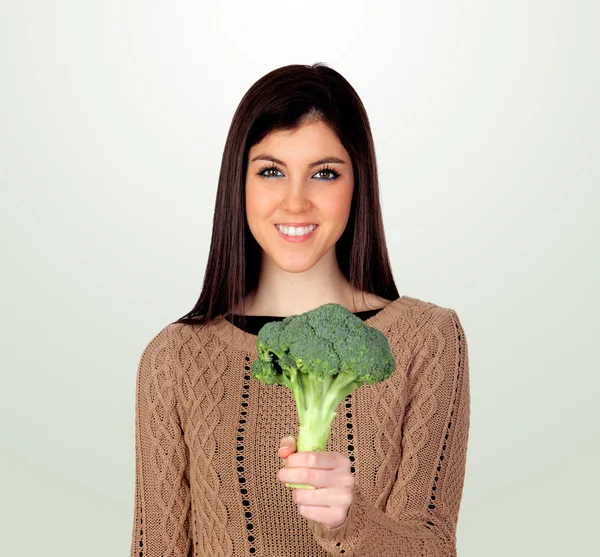 Chica atractiva con brócoli — Foto de Stock