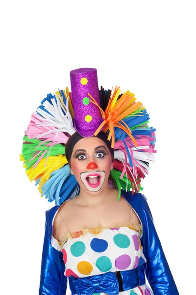 Chica sorprendida payaso con una gran peluca de colores —  Fotos de Stock