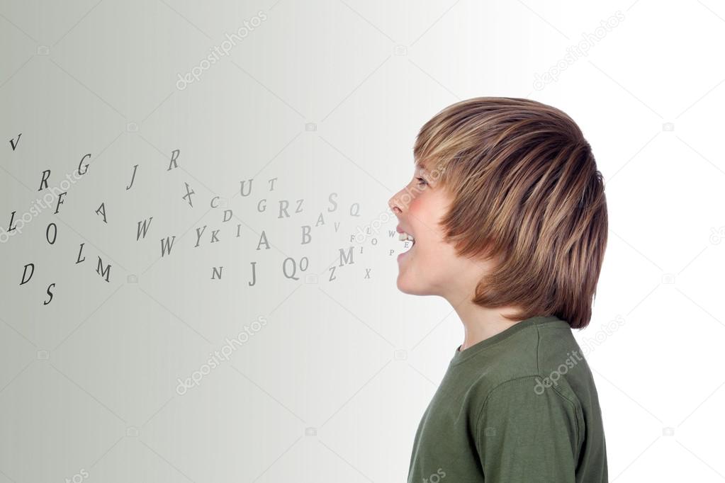 Adorable preteen with many letters out of his mouth