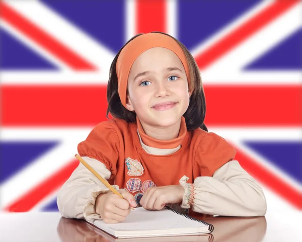 Menina feliz bonito estudando — Fotografia de Stock