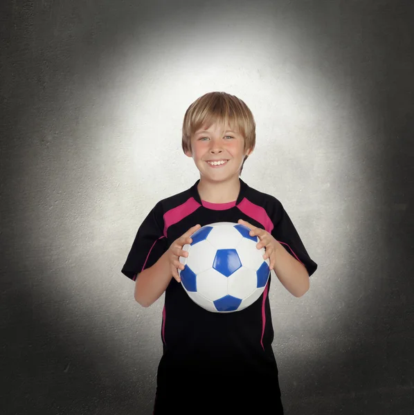 Preteen com um uniforme para jogar futebol — Fotografia de Stock