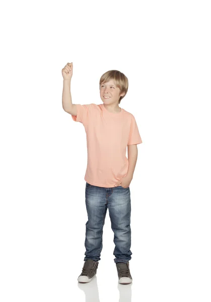 Lächelnder Junge, der seinen Arm hebt und etwas hält — Stockfoto