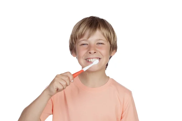 Lachende jongen zijn tanden poetsen — Stockfoto