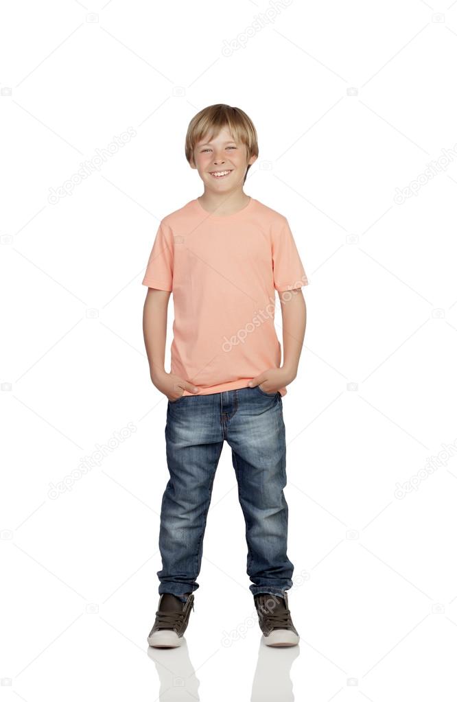 Smiling boy with jeans standing