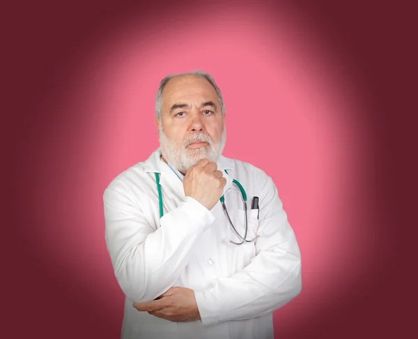 Thoughtful old doctor — Stock Photo, Image