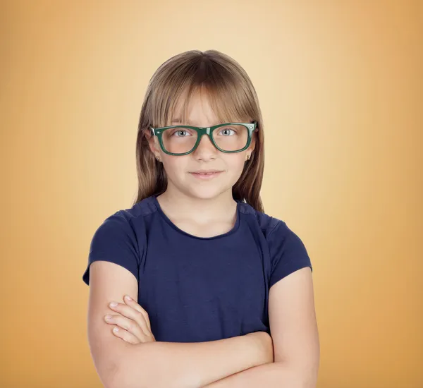 Beautiful little girl with glasses — Stock Photo, Image