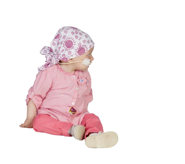 Adorable baby with a headscarf beating the disease — Stock Photo, Image