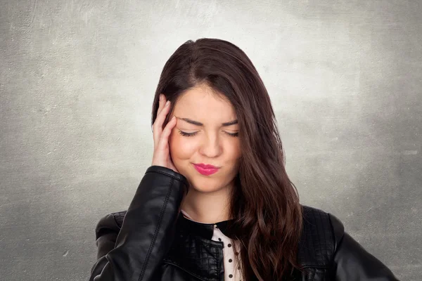 Brunette girl with headache — Stock Photo, Image