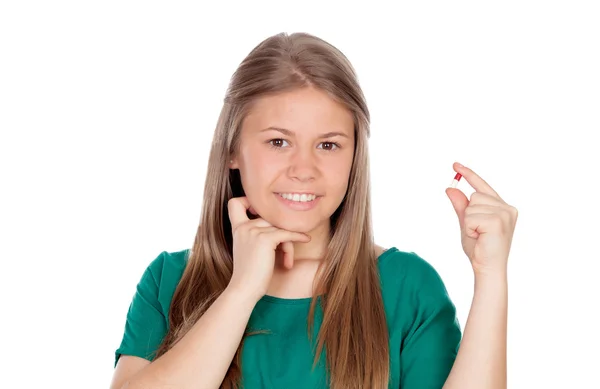 Pretty young girl with a pill — Stock Photo, Image