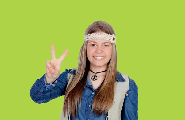 Pretty girl with hippie clothes making the peace symbol — Stock Photo, Image