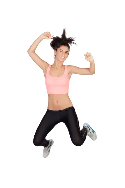 Attractive brunette girl with fitness clothing jumping — Stock Photo, Image