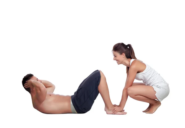 Gimnasio hombres haciendo ejercicio con su entrenador personal —  Fotos de Stock