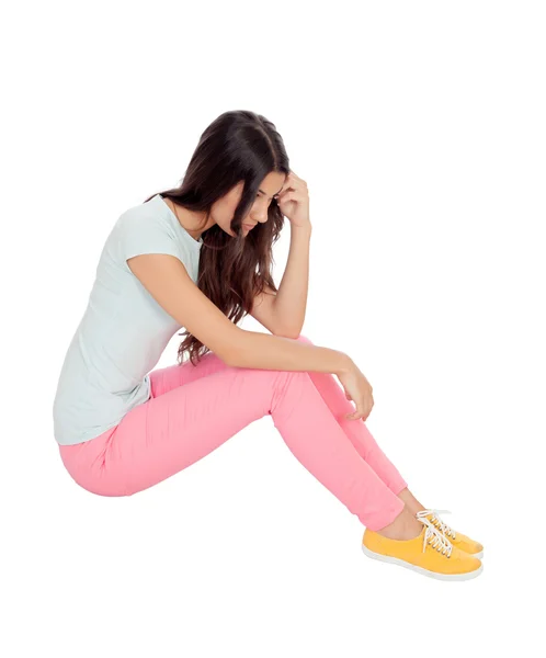 Sad girl sitting on the floor — Stock Photo, Image