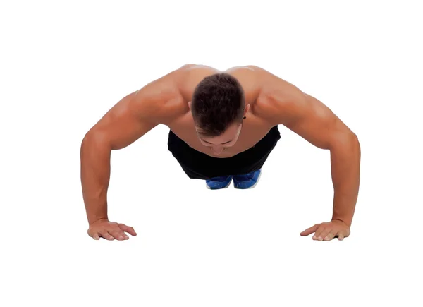 Muscular man doing pushups — Stock Photo, Image