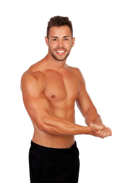 Strong man showing his muscles — Stock Photo, Image