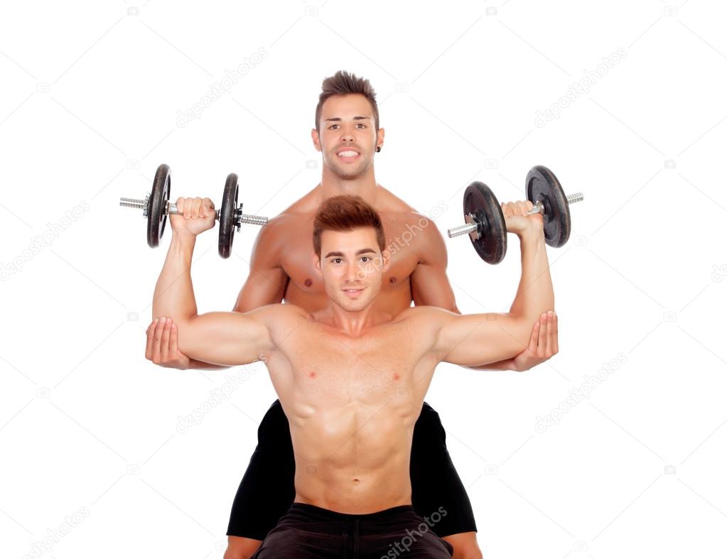 Couple of friends lifting weights