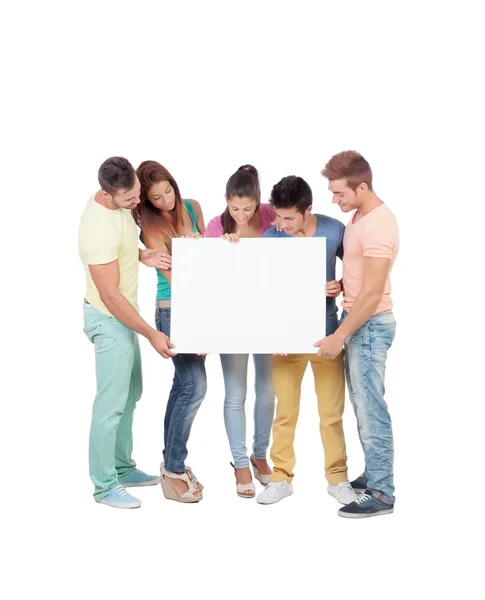 Group of young people with a blank placard — Stock Photo, Image