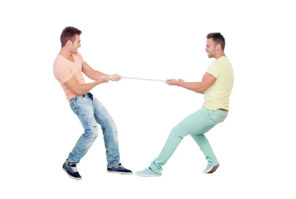 Two boys pulling a rope — Stock Photo, Image