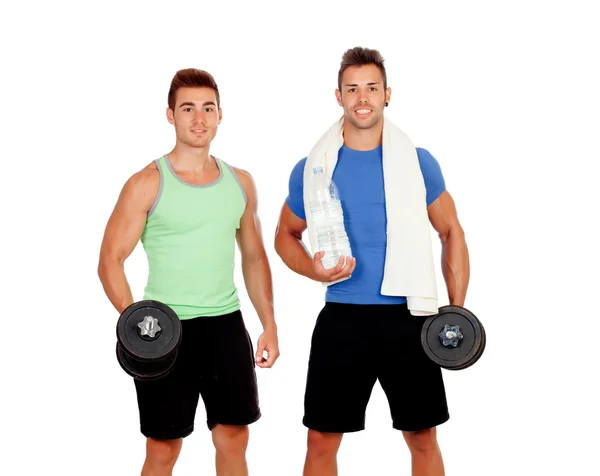 Personal trainer and strong boy with dumbbels — Stock Photo, Image