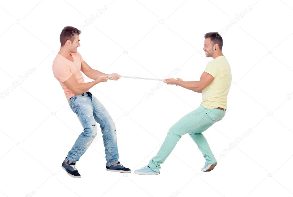 Two boys pulling a rope
