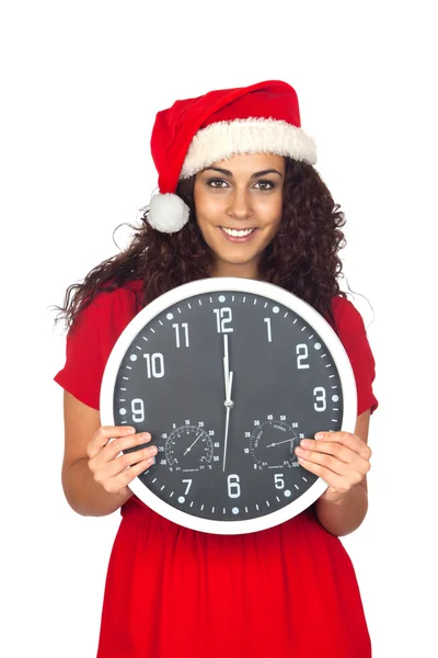 Girl in christmas hat with clock — Stock Photo, Image