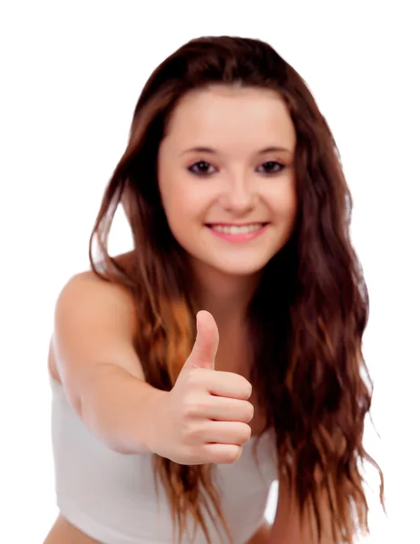 Young teenage saying Ok with focus on her thumb — Stock Photo, Image