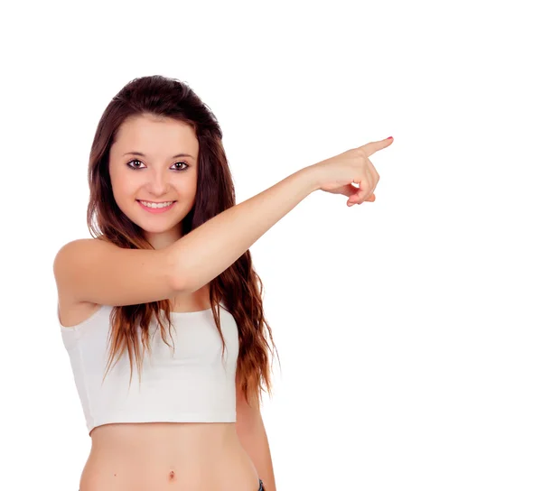 Young teenage girl pointing at something — Stock Photo, Image