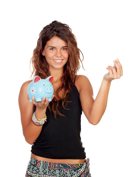 Casual Girl mit einem blauen Sparschwein — Stockfoto