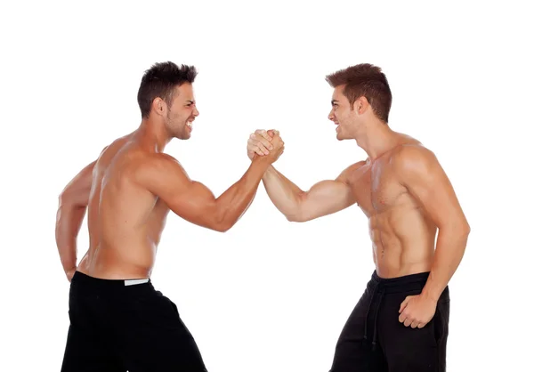 Couple of handsome muscled men competing — Stock Photo, Image