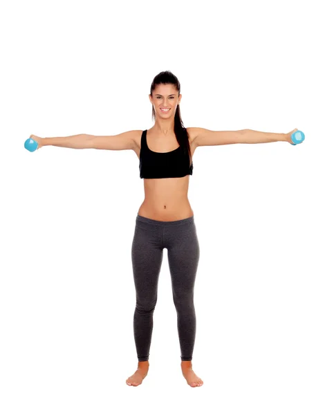 Happy brunette girl toning the muscles — Stock Photo, Image