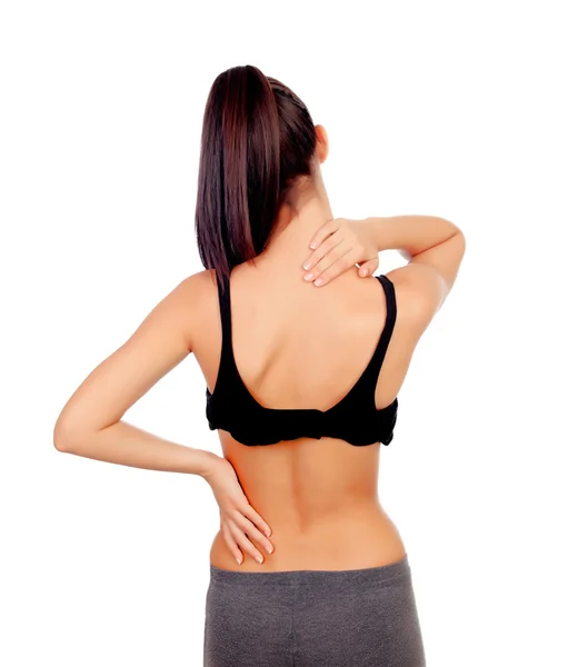 Mujer en ropa deportiva con dolor de espalda — Foto de Stock