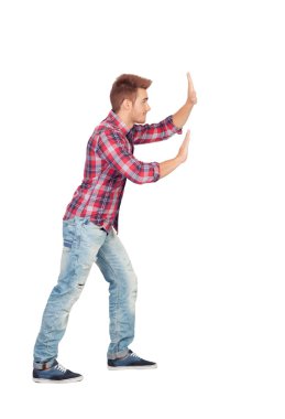 Young man with plaid shirt pushing clipart